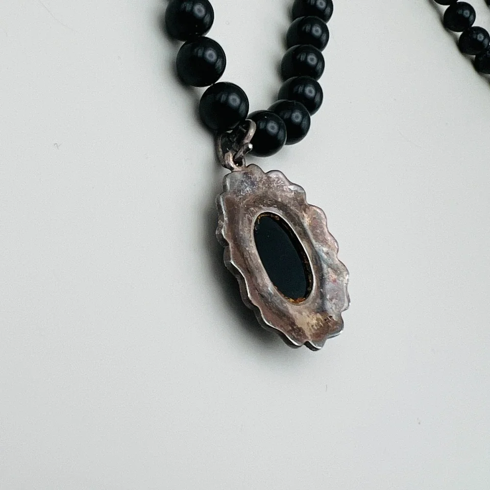 Vintage Mother of Pearl Cameo Sterling Silver Marcasite Frame Black Beaded Chain